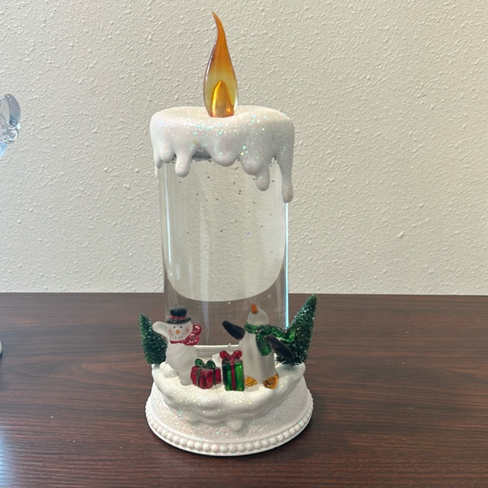 Candle snow globe. Approx 10” tall.